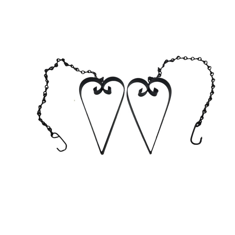vintage pair of indoor/outdoor black metal hanging hearts